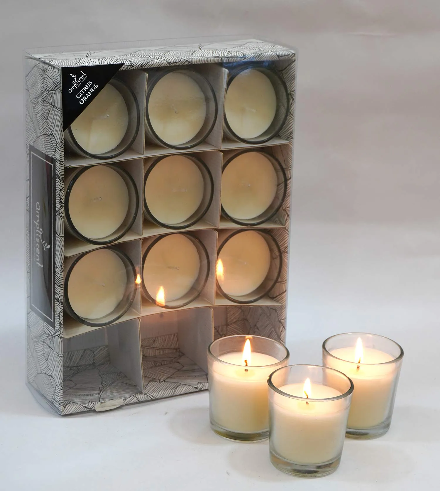 Ampliscent White Scented Glass Votive Candle - Set of 12 | Bulk Pack for Weddings, Bridal Showers or Home Parties and Centerpieces (Citrus Orange)